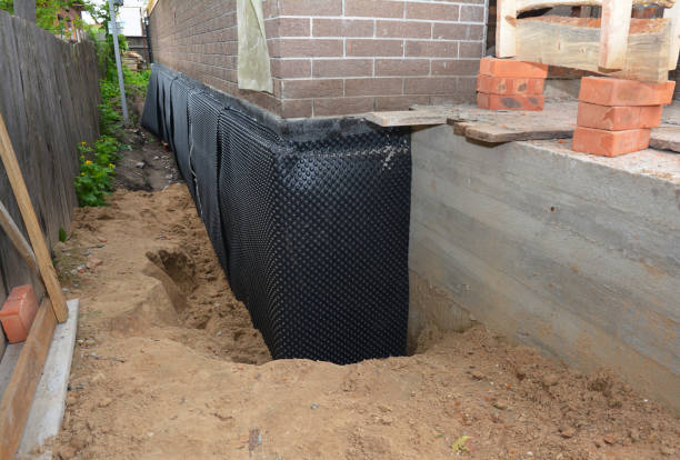 Happy homeowners after waterproofing job in Gas City